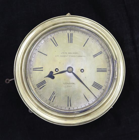 A Victorian brass bulkhead clock, by John Walker of Regent Street and Cornhill, 10in. D.6.5in.